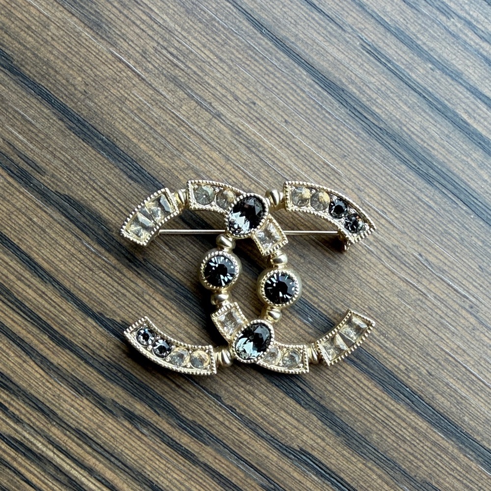Gold and Black Designer Brooch